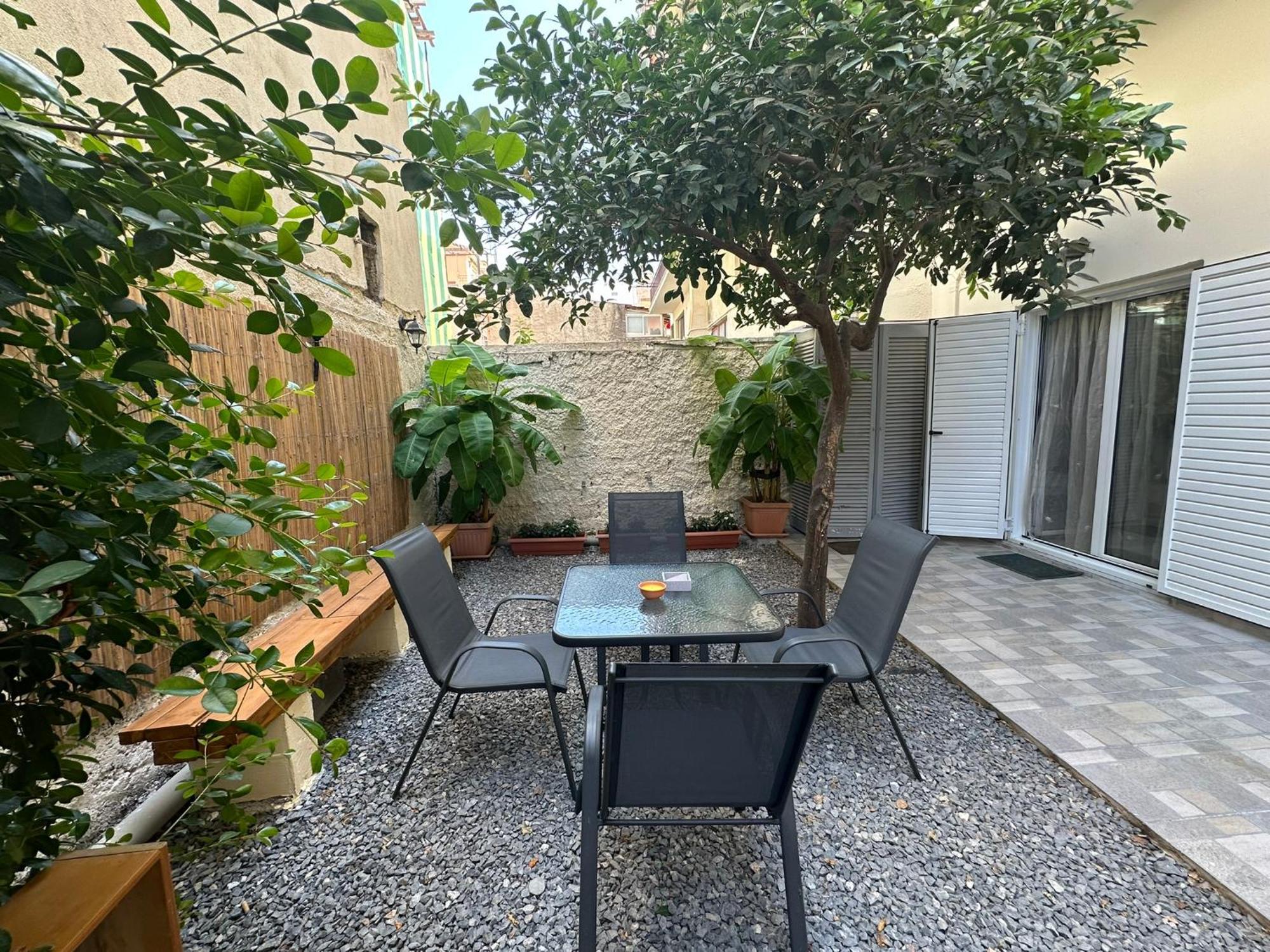 Apartment Evterpi - With Loft And Garden In The Heart Of